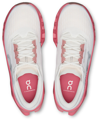 Oberansicht von weißen Laufschuhen mit rosa Details und Logo. Oberansicht von weißen Laufschuhen mit rosa Details und Logo.