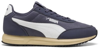 Férfi sötétkék Puma cipő fehér csíkkal és bézs talppal. Férfi sötétkék Puma cipő fehér csíkkal és bézs talppal.