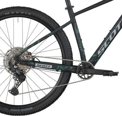 Teil eines schwarzen Mountainbikes mit dunkelgrünen Akzenten.