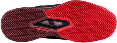Schuhsohle eines HEAD Tennisschuhs mit roten und weinroten Profil.