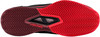 Schuhsohle eines HEAD Tennisschuhs mit roten und weinroten Profil.
