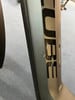 Detail eines E-Bike-Rahmens mit CUBE-Logo und kleiner Lackbeschädigung.