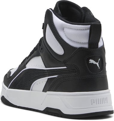 Černobílá kotníková bota Puma s bílým pruhem a logem na patě.