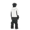 Rückansicht einer Person in einer schwarz-weißen Skijacke und Hose.