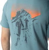 T-Shirt mit Aufdruck von Skifahrern im Sonnenuntergang.