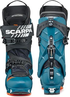Scarpa Skischuhe mit orangefarbenen Details und verstellbaren Schnallen. Scarpa Skischuhe mit orangefarbenen Details und verstellbaren Schnallen.