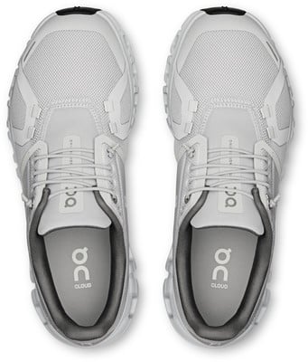 Draufsicht auf ein Paar weißer Laufschuhe mit grauen Details.