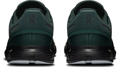 Grüne Laufschuhe von On Running mit schwarzer Sohle und Logo. Grüne Laufschuhe von On Running mit schwarzer Sohle und Logo.