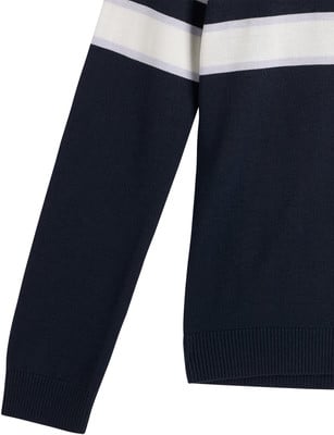 Dunkelblauer Pullover mit weißen und violetten Streifen am Ärmel. Dunkelblauer Pullover mit weißen und violetten Streifen am Ärmel.