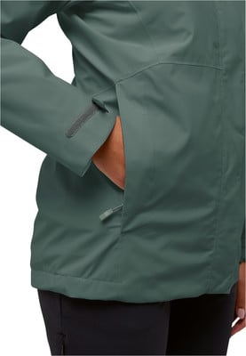 Grüne Jacke mit Tasche und Reißverschluss, Ärmeldetail. Grüne Jacke mit Tasche und Reißverschluss, Ärmeldetail.