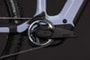 Detail eines E-Bikes mit Kette, Kurbel und ACID-Logo.