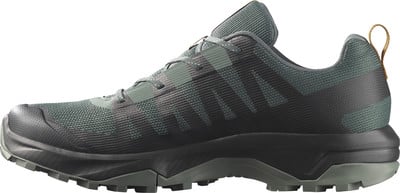 Herren-Trailrunning-Schuh in Dunkelgrün mit schwarzen Details. Herren-Trailrunning-Schuh in Dunkelgrün mit schwarzen Details.