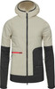 Leichte beige Jacke mit schwarzen Ärmeln und roter Tasche.