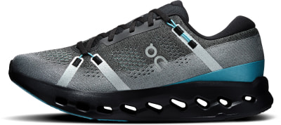 Graue Laufschuhe mit schwarzer Sohle und türkisfarbenen Akzenten. Graue Laufschuhe mit schwarzer Sohle und türkisfarbenen Akzenten.