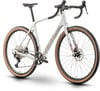 Weißes Gravelbike mit beigen Reifen und roten Details an der Gabel.