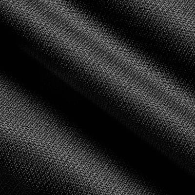 Detailaufnahme von schwarzem Stoff mit feinem Muster. Detailaufnahme von schwarzem Stoff mit feinem Muster.