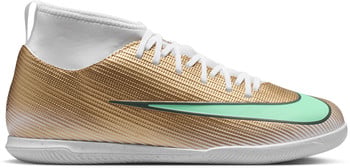 Goldene Nike Fußballschuhe mit weißem Kragen und türkisfarbenem Logo.