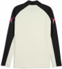 Beige Puma Langarmshirt mit schwarzen Ärmeln und rosa Logo.