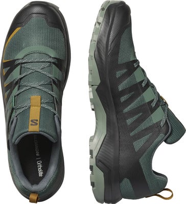 Herren-Trailrunning-Schuhe von Salomon in Dunkelgrün mit schwarzen Akzenten. Herren-Trailrunning-Schuhe von Salomon in Dunkelgrün mit schwarzen Akzenten.