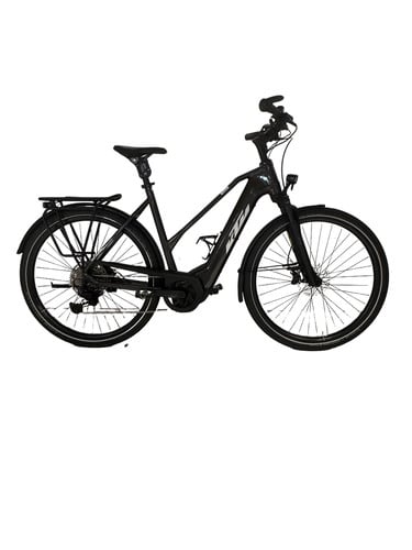 Schwarzes Elektrofahrrad mit Gepäckträger und Federung.