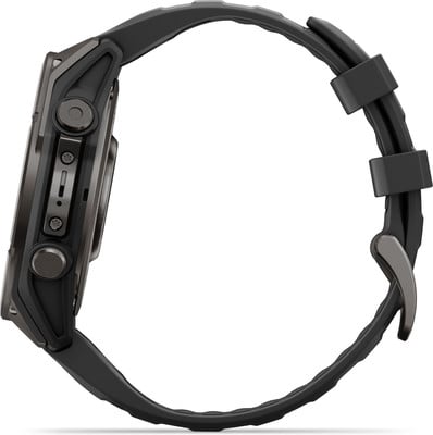 Detail einer Smartwatch mit schwarzem Armband und seitlichen Tasten. Detail einer Smartwatch mit schwarzem Armband und seitlichen Tasten.