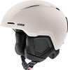 Ein beiger UVEX Skihelm mit schwarzem Logo und verstellbaren Riemen.
