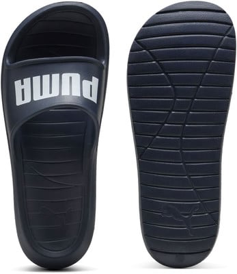 Dunkelblaue Puma-Schiebelette mit weißem Logo und rutschfester Sohle.