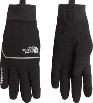 Schwarze The North Face Handschuhe mit Reflektoren und Windwall-Technologie.