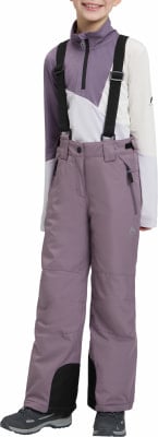Mädchen in Skibekleidung mit lila Hose und farbenfroher Jacke. Mädchen in Skibekleidung mit lila Hose und farbenfroher Jacke.