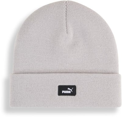 Graue Puma-Strickmütze mit schwarzem Logo auf der Vorderseite. Graue Puma-Strickmütze mit schwarzem Logo auf der Vorderseite.