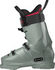 Ein grüner Skischuh mit Schnallen und Riemen, für erfahrene Skifahrer.