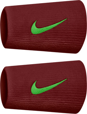 Zwei dunkelrote Nike-Schweißbänder mit grünem Logo. Zwei dunkelrote Nike-Schweißbänder mit grünem Logo.