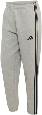 Graue Adidas Trainingshose mit schwarzen Streifen und Logo.