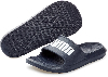Dunkelblaue Puma-Slipper mit weißem Logo und gemusterter Sohle.