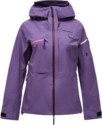 Lila Skijacke mit Kapuze und Peak Performance Logo. Lila Skijacke mit Kapuze und Peak Performance Logo.