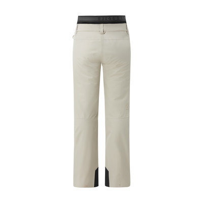 Beige Skihose mit schwarzem Bund und Logo, weißer Hintergrund. Beige Skihose mit schwarzem Bund und Logo, weißer Hintergrund.