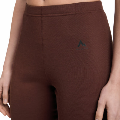 Braune Damenleggings mit einem Berglöwen-Logo auf dem Oberschenkel.