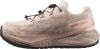 Beige Laufschuhe mit Schnellverschluss und oranger Schrift.