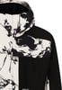 Jacke mit abstraktem schwarz-weißem Muster und schwarzen Einsätzen.