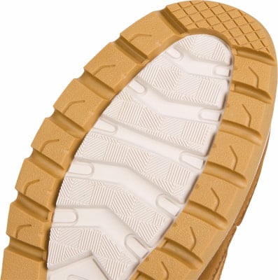 Schuhsohle mit ausgeprägtem Profil und braunem Rand. Schuhsohle mit ausgeprägtem Profil und braunem Rand.