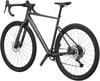 Graues Gravelbike mit Scheibenbremsen und schwarzen Reifen.