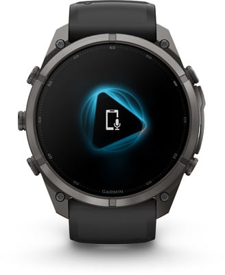 Eine Garmin Smartwatch mit einem Telefon- und Mikrofon-Symbol auf dem Display. Eine Garmin Smartwatch mit einem Telefon- und Mikrofon-Symbol auf dem Display.
