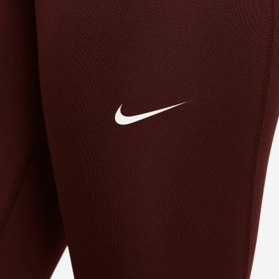 Damen-Leggings von Nike in Dunkelrot mit Logo. Damen-Leggings von Nike in Dunkelrot mit Logo.