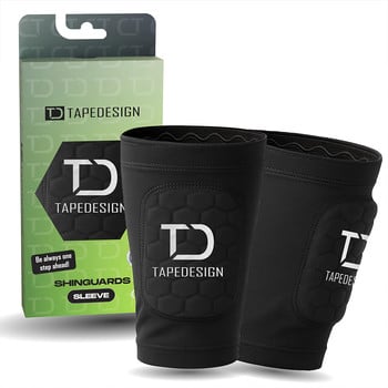 Schwarze Schienbeinschoner mit TD TAPEDESIGN Logo und Verpackung.
