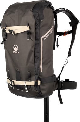 Čierny turistický batoh Kohla Alpinist Tour s béžovými popruhmi a logom. Čierny turistický batoh Kohla Alpinist Tour s béžovými popruhmi a logom.