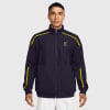 Herren dunkelblaue Nike Jacke mit gelben Streifen und Logo.