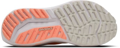 Brooks Laufschuhsohle mit orangefarbenen und beigen Elementen und Logo. Brooks Laufschuhsohle mit orangefarbenen und beigen Elementen und Logo.