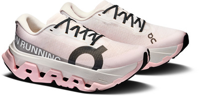 Rosa Laufschuhe mit weißer und schwarzer Sohle und Logo Rosa Laufschuhe mit weißer und schwarzer Sohle und Logo
