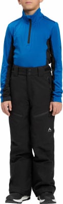 Junge in blau-schwarzer Skijacke und schwarzer Skihose. Junge in blau-schwarzer Skijacke und schwarzer Skihose.