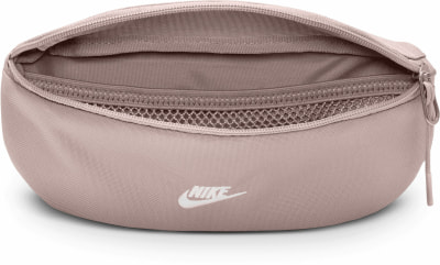 Eine rosafarbene Nike Bauchtasche mit mehreren Reißverschlüssen und einer Netztasche. Eine rosafarbene Nike Bauchtasche mit mehreren Reißverschlüssen und einer Netztasche.